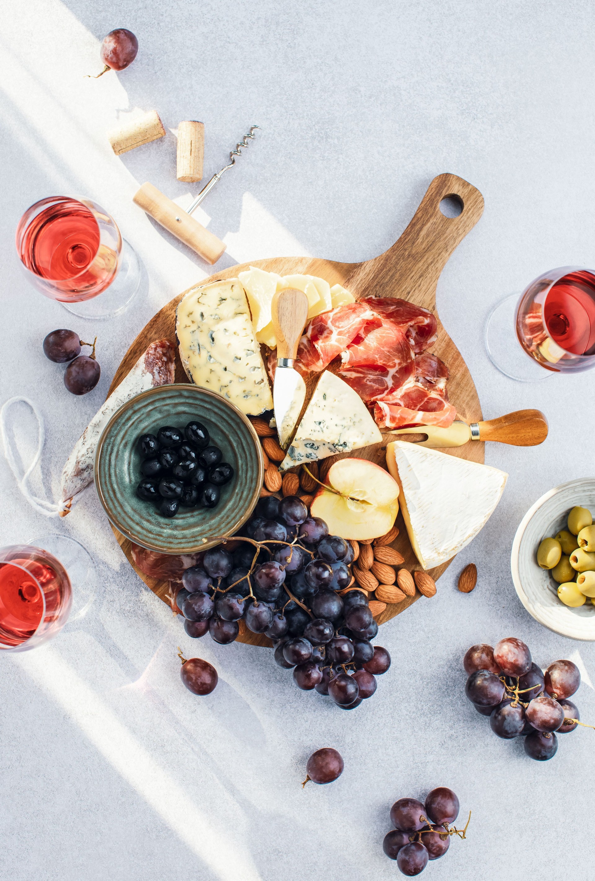 Wine tasting snack cheese board, top down view